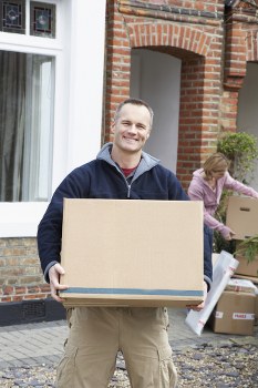 Local removals service preparing furniture for delivery in West London