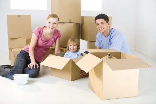 Removal team explaining transparent pricing for a Hammersmith property move
