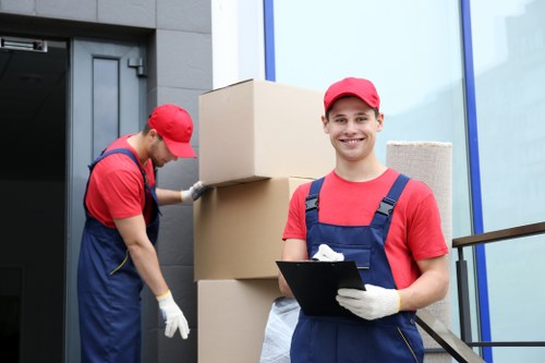 Removal team preparing items for a scheduled house move