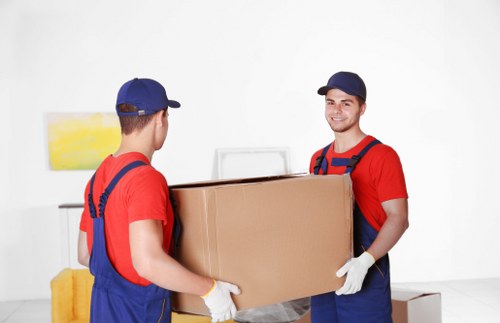 Moving home preparation in Hammersmith with packed boxes and a removals van