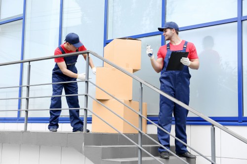 Removal team preparing a quote for a small flat move in Hammersmith