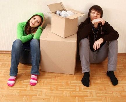 Removal team handling a flat move in Hammersmith with boxes and furniture
