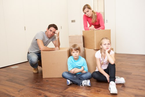 Packed boxes and furniture ready for transport in West London